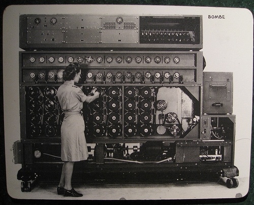 A US Navy WAVE sets the Bombe rotors prior to a run